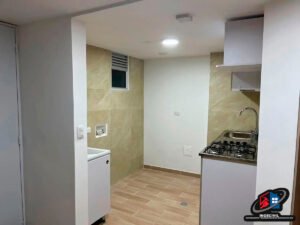 Acabados arquitectónicos 22 Piso laminado antihumedad en zona de alto tránsito